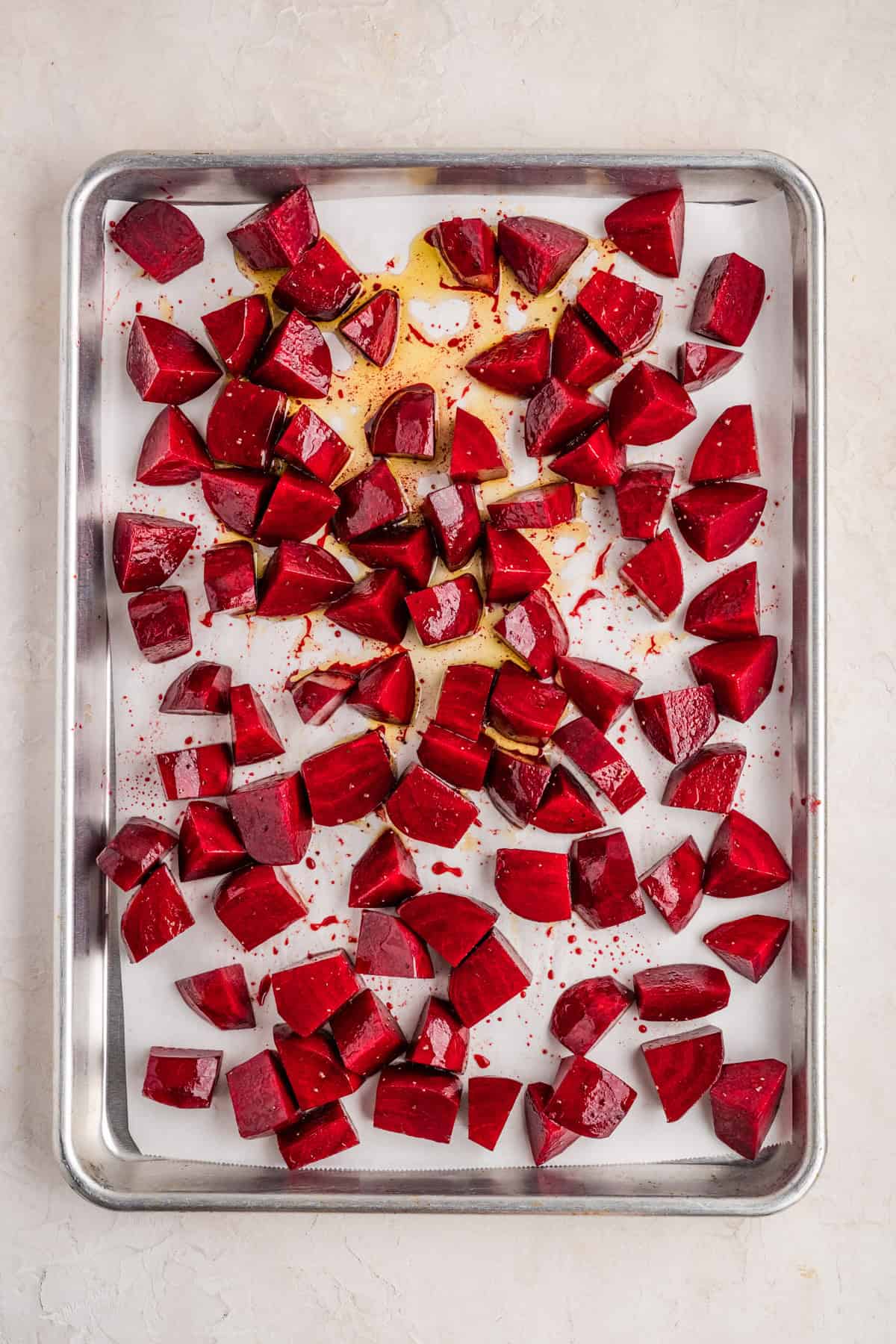 Raw beets on a baking sheet