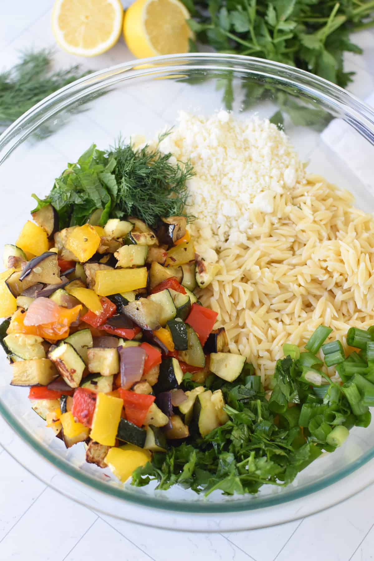 Roasted Vegetables in a glass bowl for an orzo salad