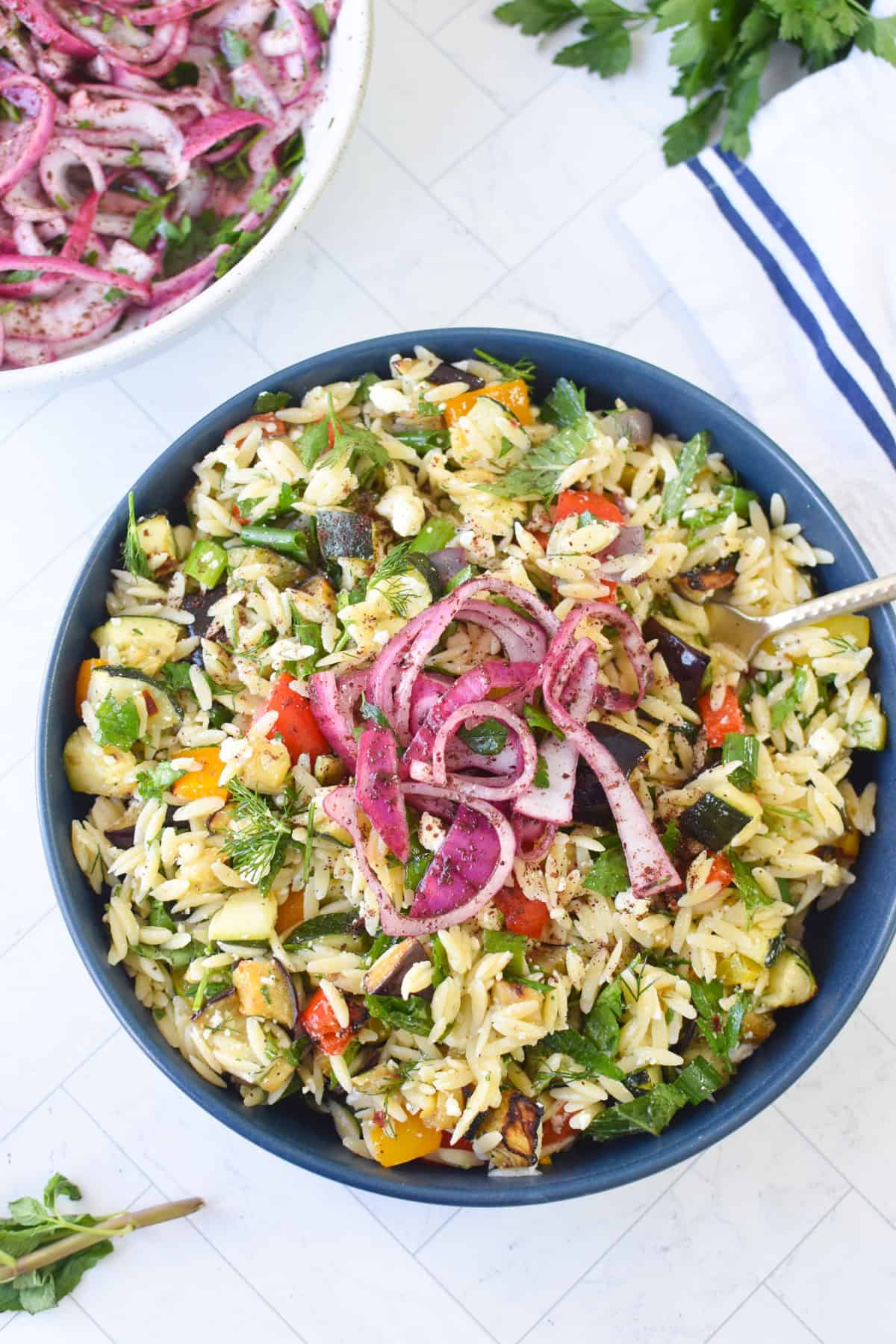 Sumac Red Onions on an orzo salad