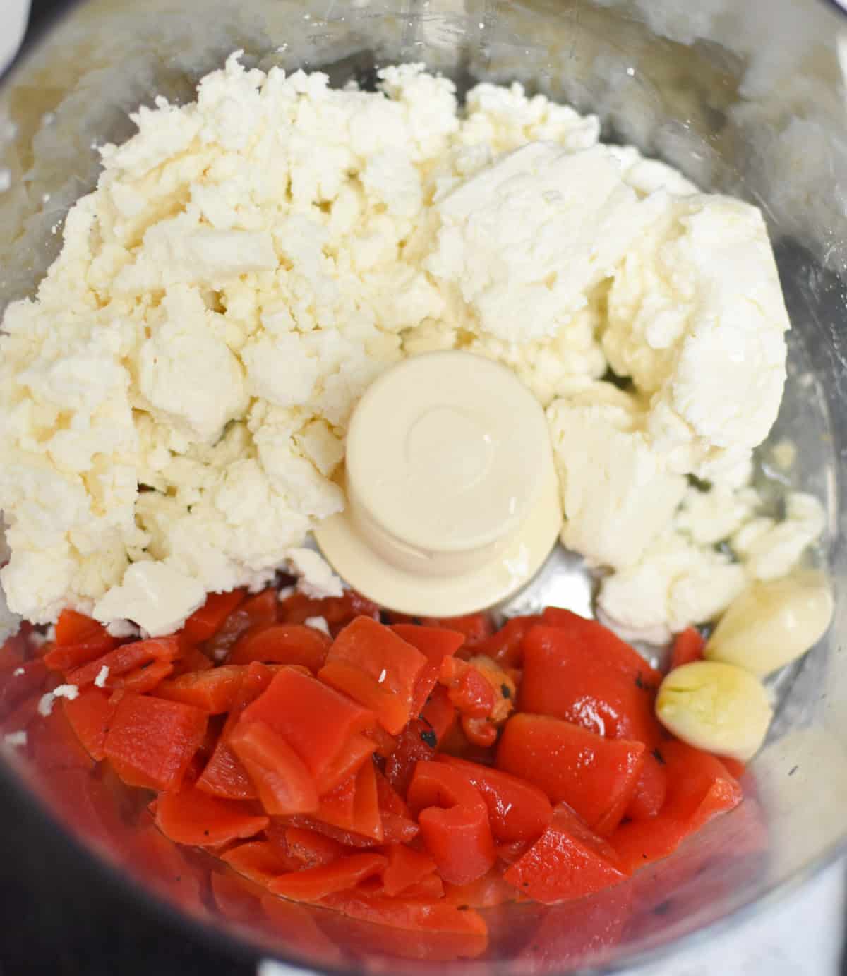 Peppers and feta in a food processor 