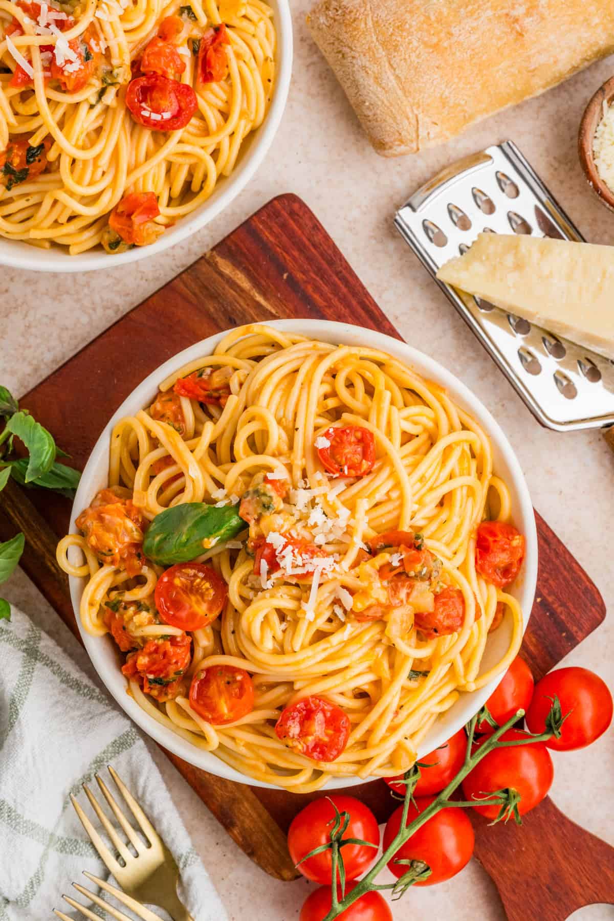 Cherry Tomato Pasta in a bowl with basil garnish