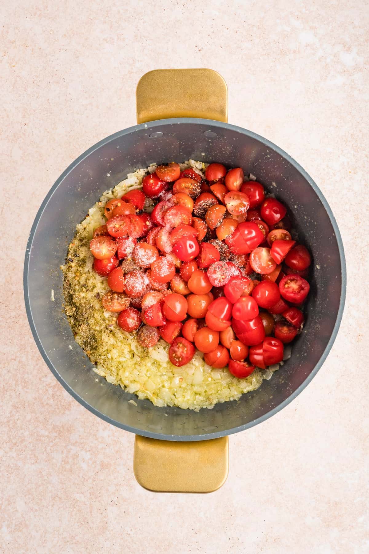 Tomato and onion in a pot