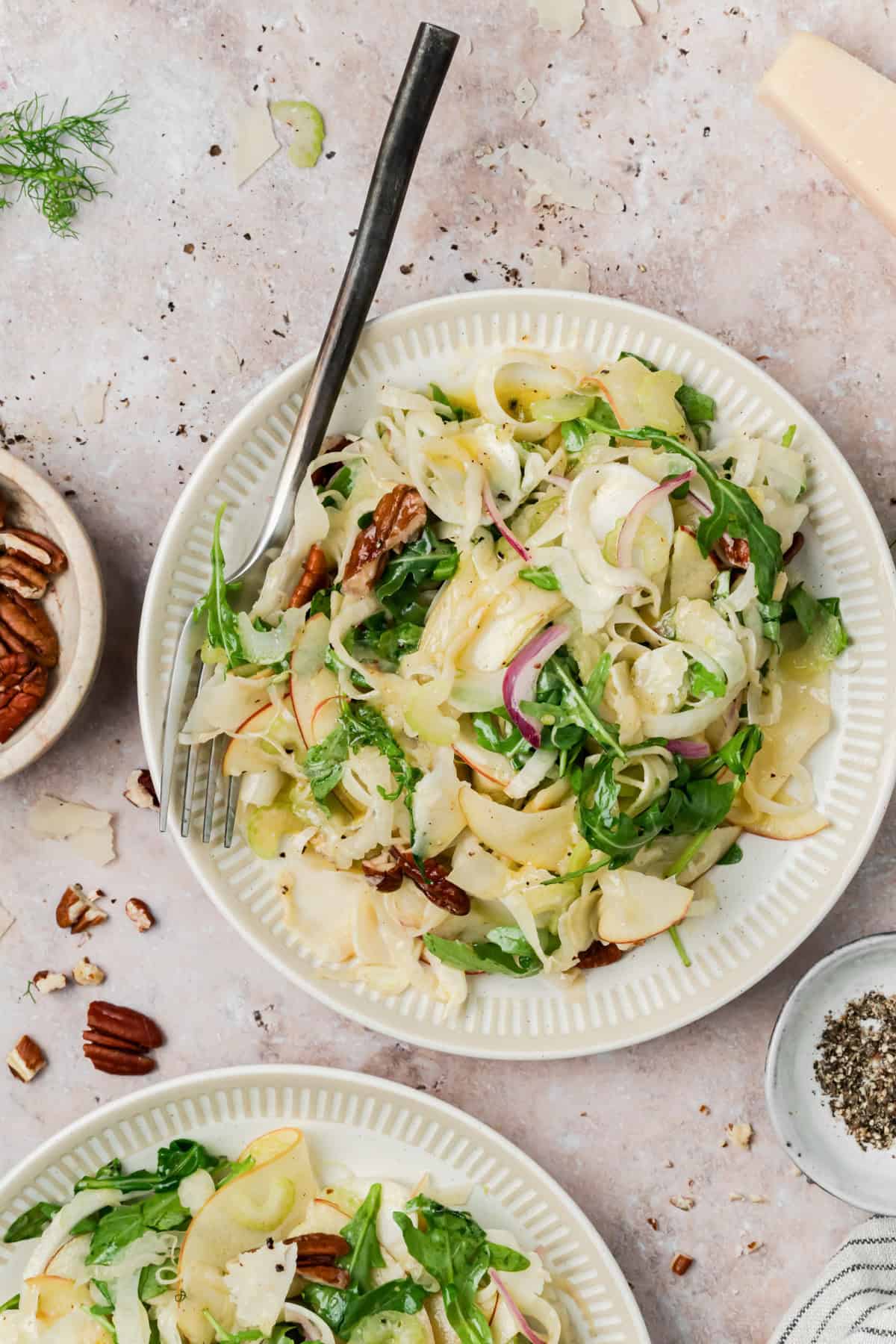 Simple Apple and Fennel Salad on a white plate