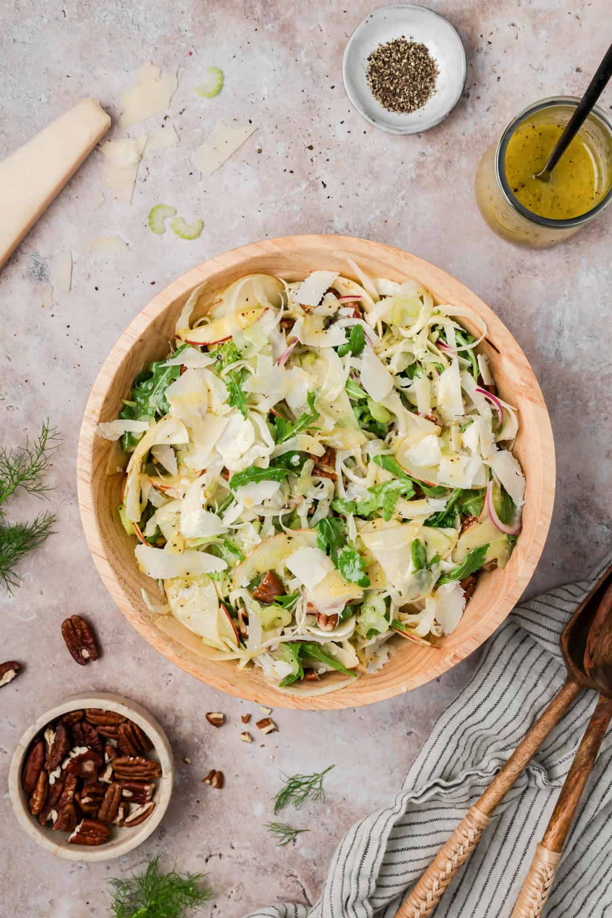 Simple Apple Celery Fennel Salad in a tan bowl