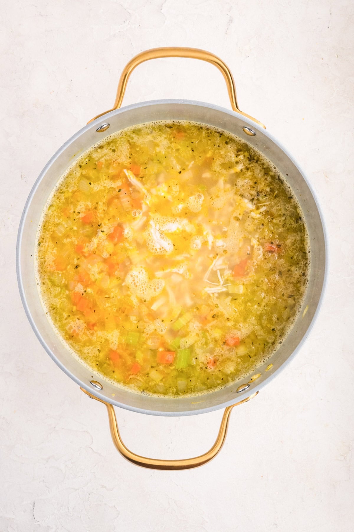 Chicken Pastina Soup in a dutch oven